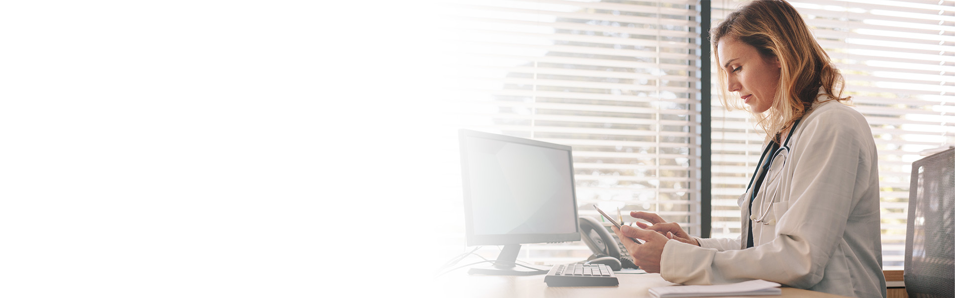 female doctor using computer
