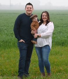 clara with partner and baby